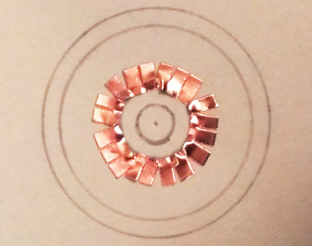 Tracing the cutouts for the sensor casing and placing the copper contact points