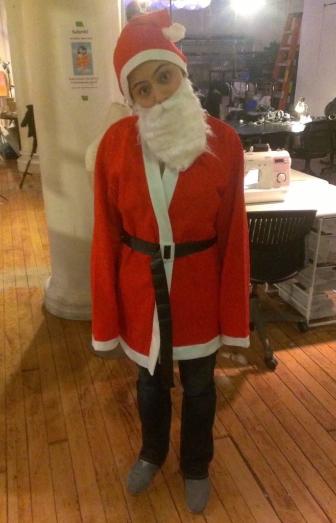 Trying on the premade Santa suit