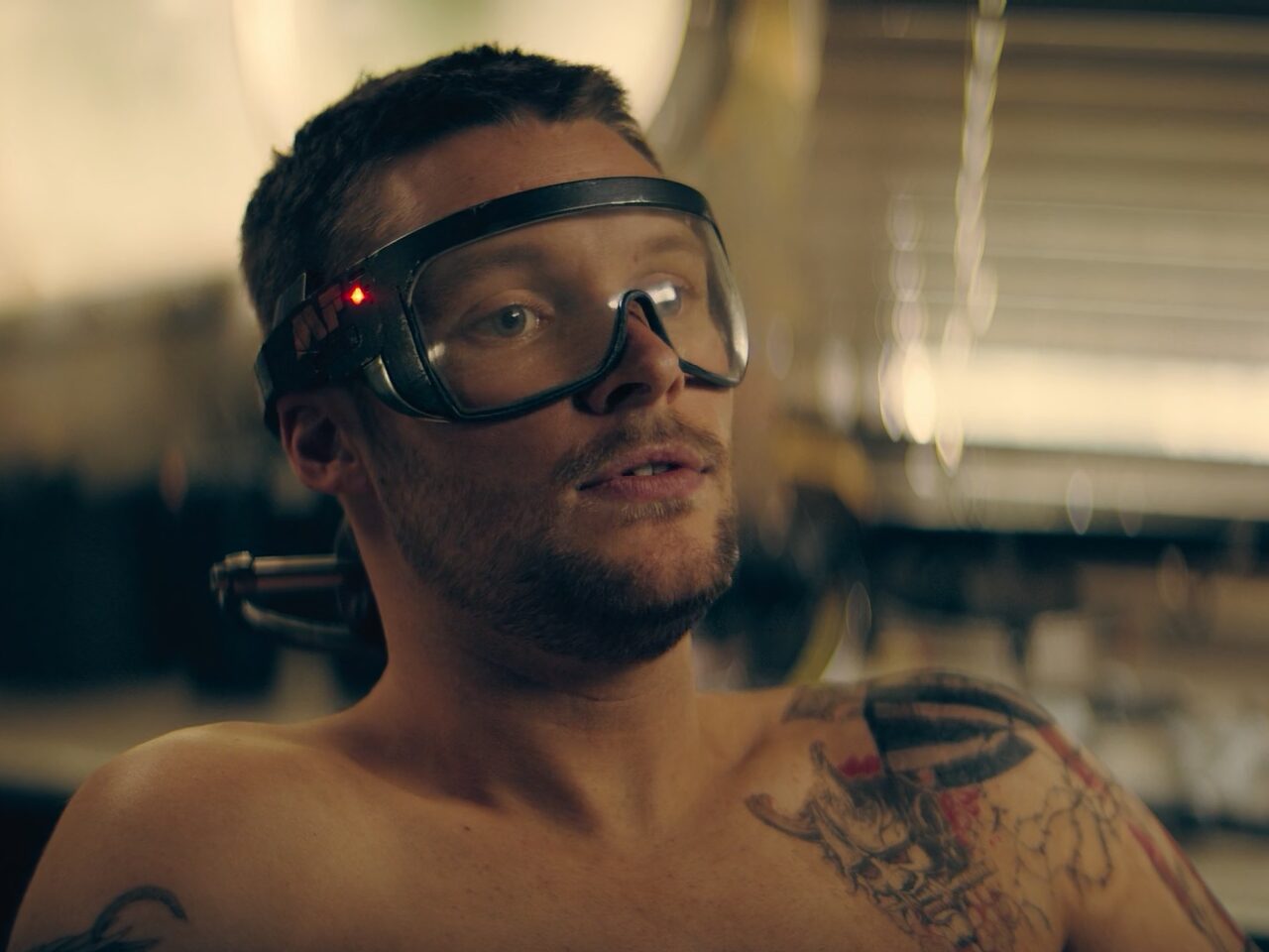 Jack Reynor as Burton Fisher using a traditional VR headset with display in transparent mode. As seen in The Peripheral (2022)